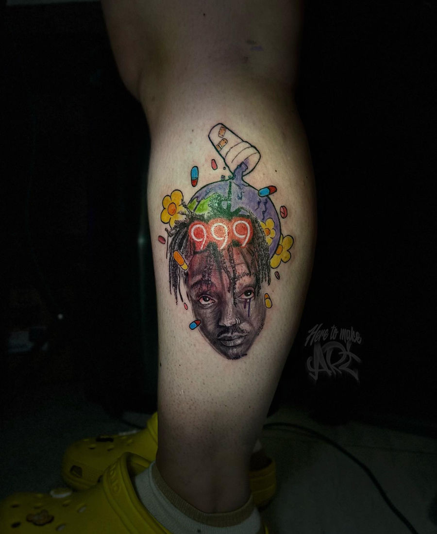 Color portrait tattoo with 999 lettering