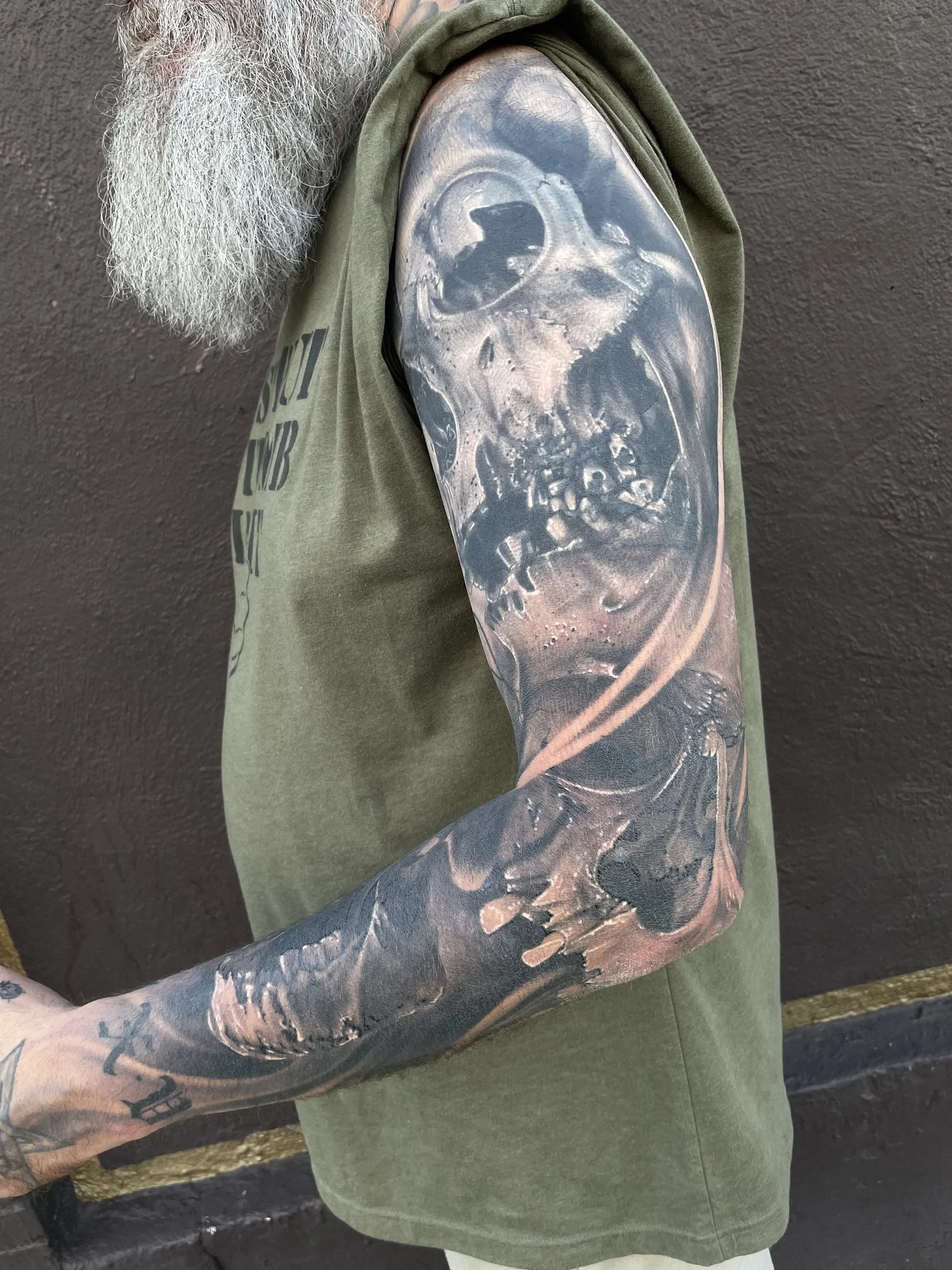 Black and grey horror skull sleeve tattoo by Bill Byers, Worcester MA