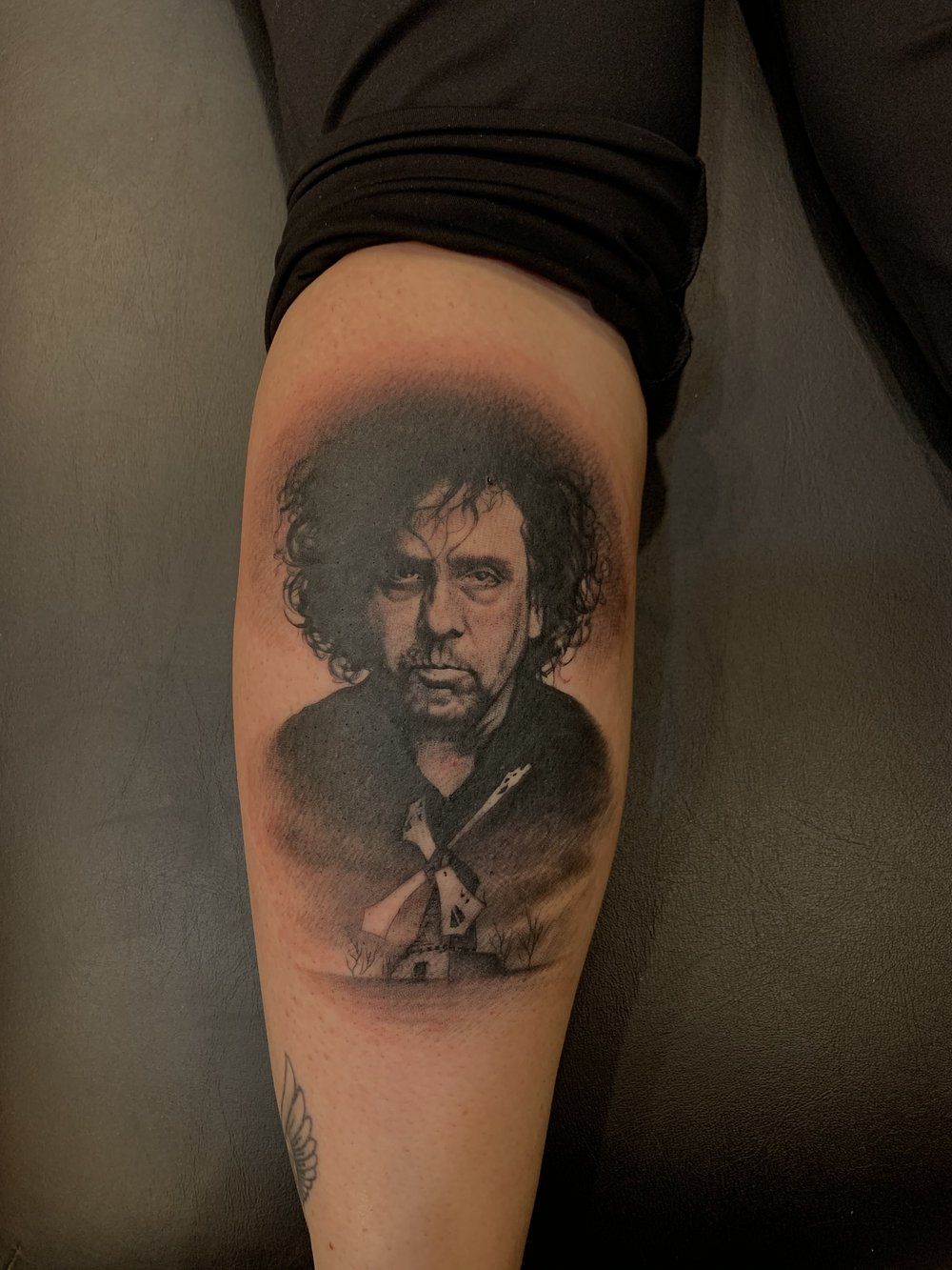 Black and grey realism portrait with windmill by Bill Byers, Worcester MA