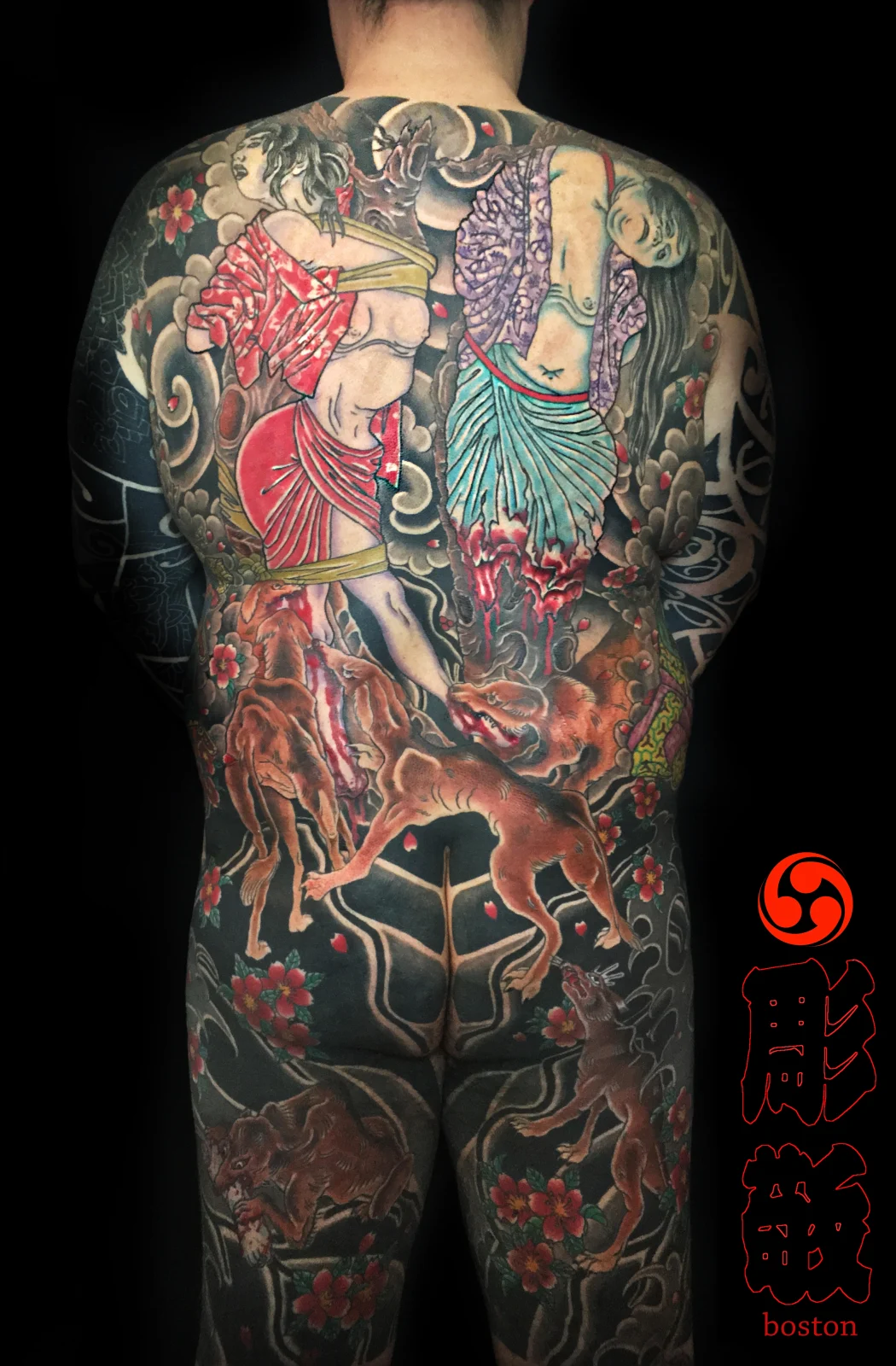 Maiden and wolves backpiece by a Chameleon Tattoo artist