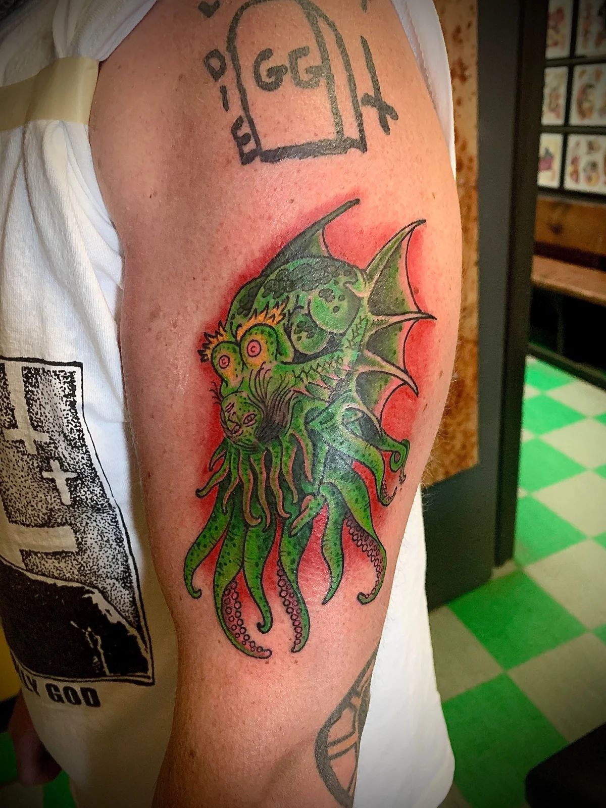 Color creature forearm tattoo