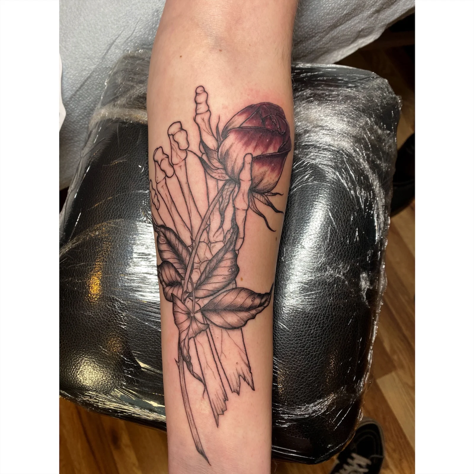 Black and grey jellyfish forearm