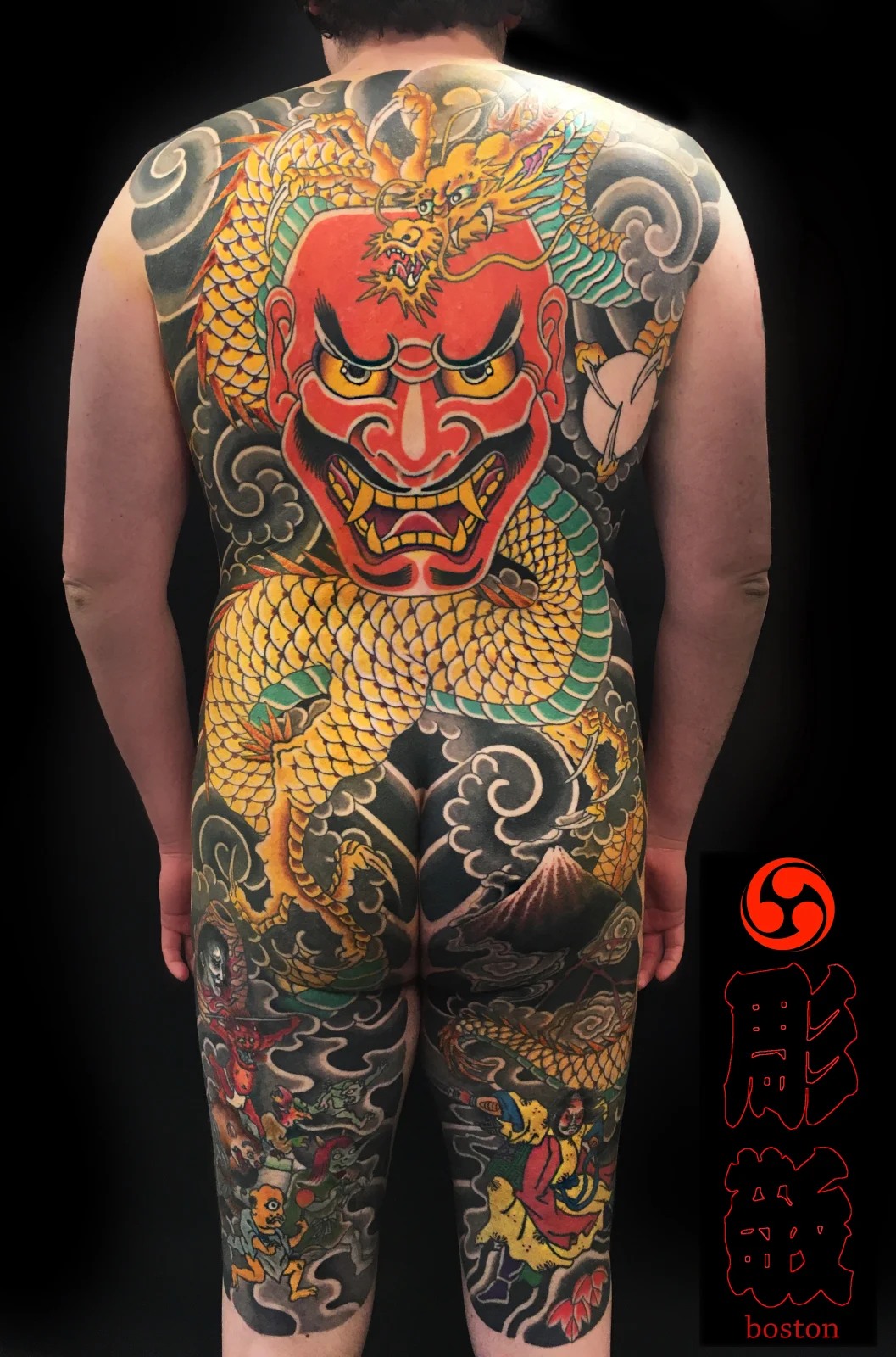 Red Hannya and gold dragon Japanese backpiece by a Chameleon Tattoo artist