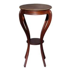 A carved mahogany pedestal accent table