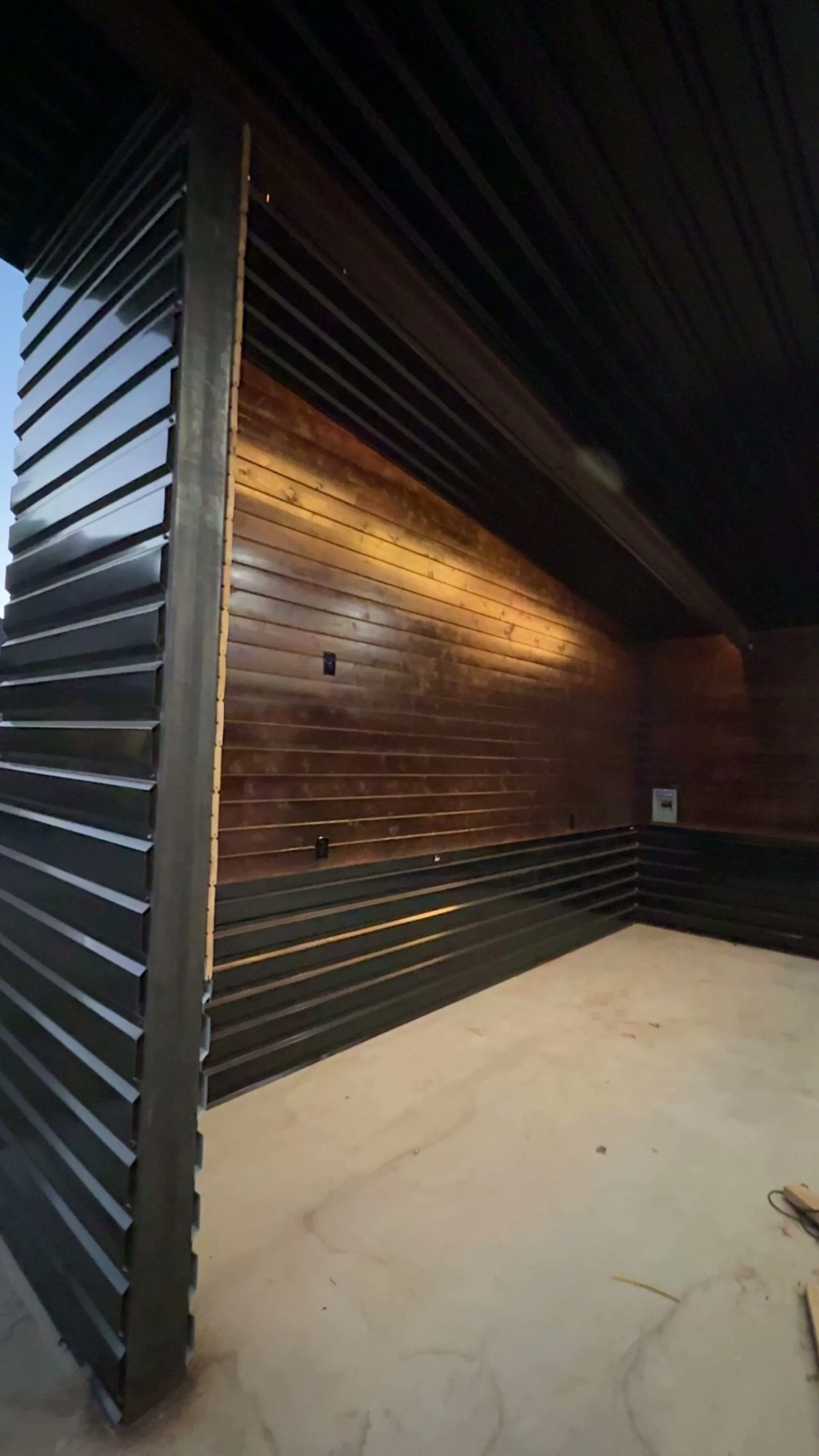 Modern custom home with timber and concrete detailing built by Guerrero Construction Group